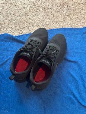 Skechers Men's Black Athletic Sneakers with Red Insoles